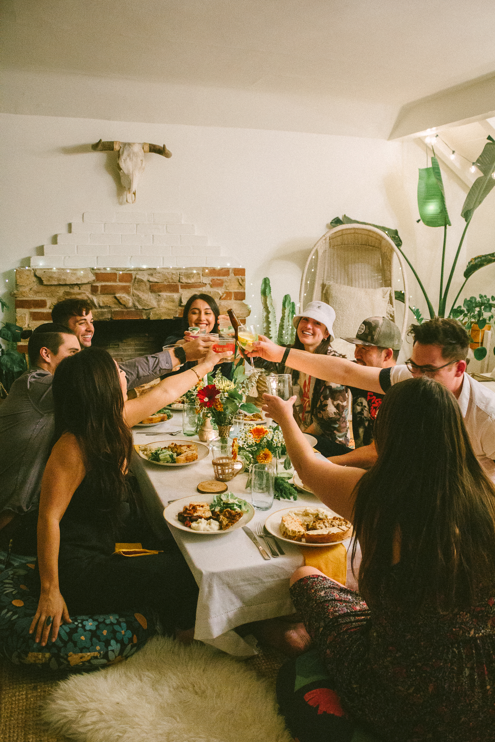 How To Style a Fun Floor Seated Friendsgiving black blooms